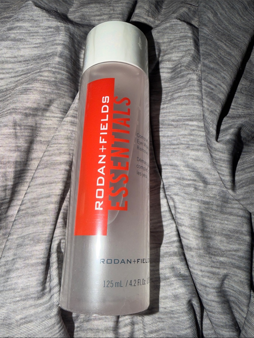 Essentials Makeup Remover by Essentials — White Cap with Red Label